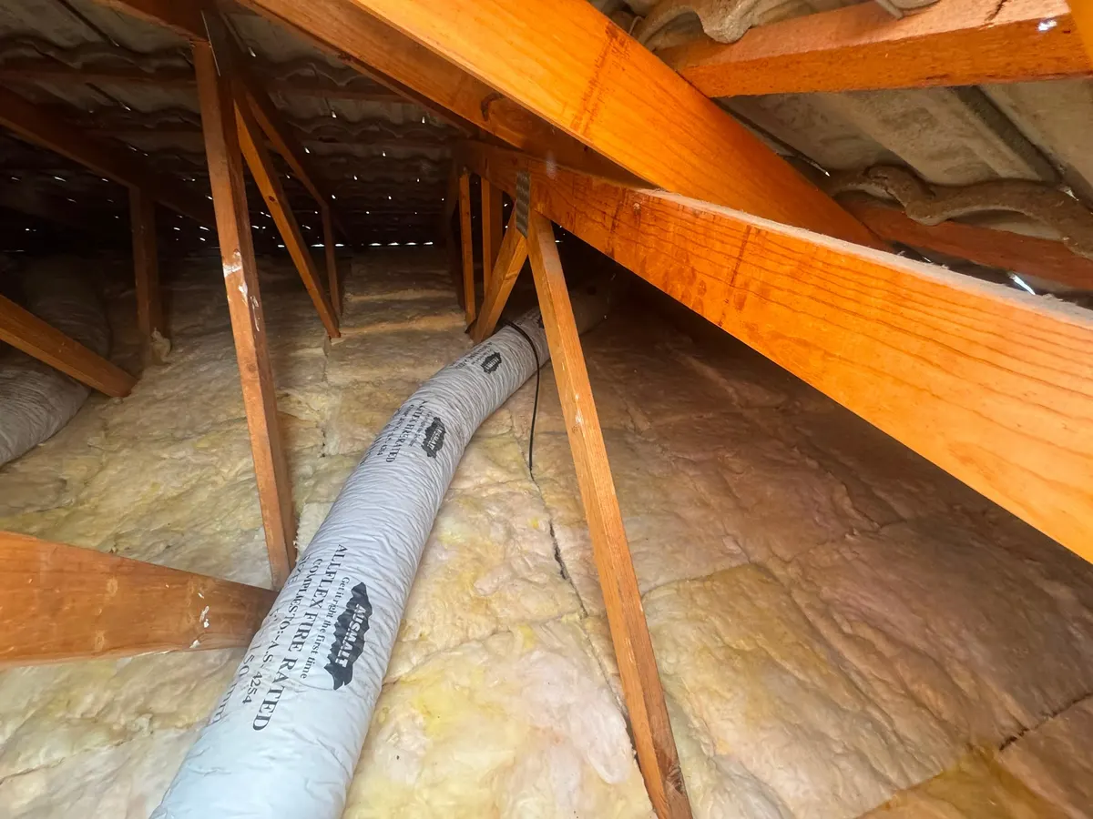 New insulation batts fitted evenly between the ceiling joists (photo 5 of 7)