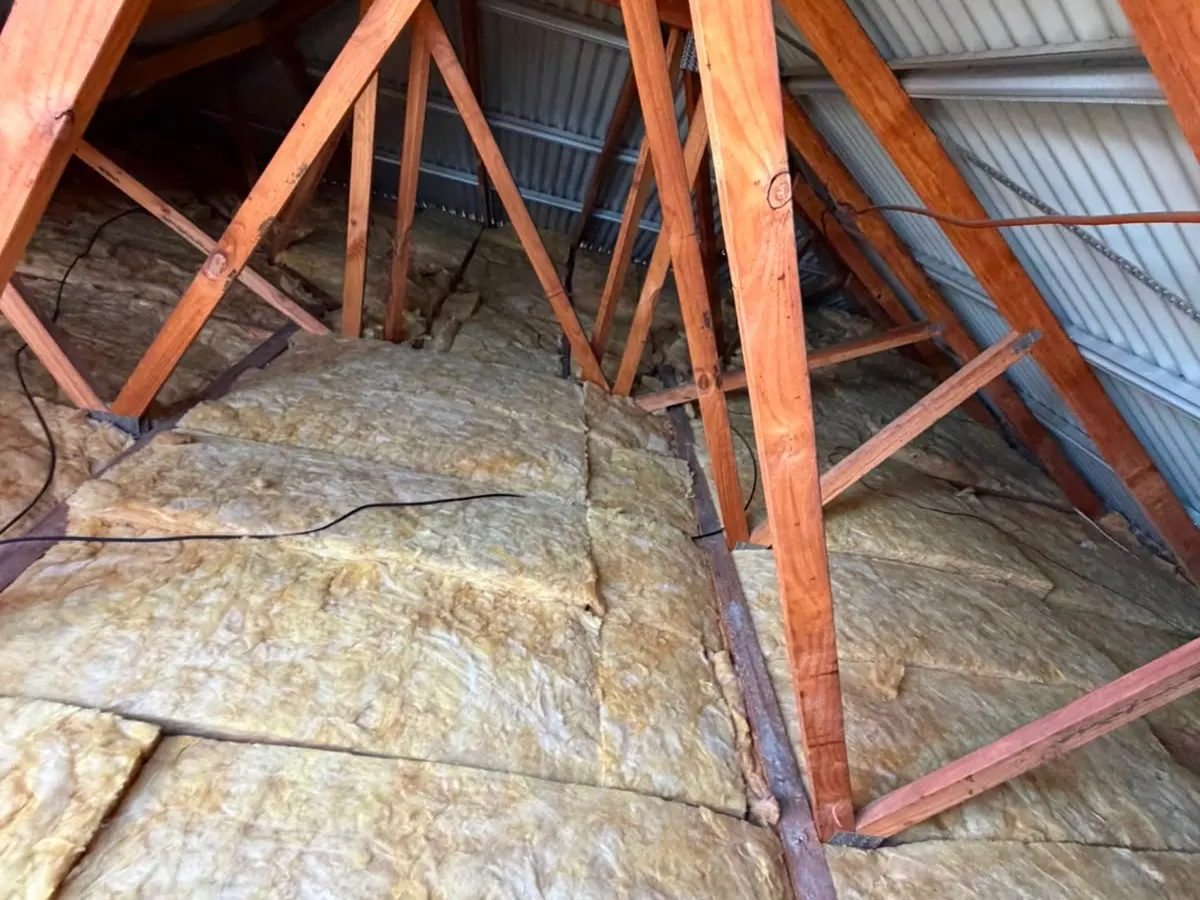 New insulation batts fitted evenly between the ceiling joists (photo 6 of 7)