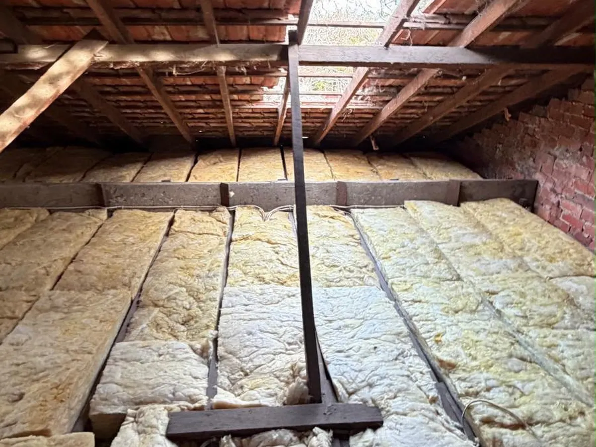 New insulation batts fitted evenly between the ceiling joists (photo 7 of 7)